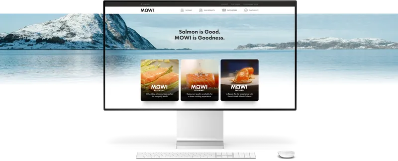 MOWI's site on a desktop monitor — “Salmon is Good. MOWI is Goodness.” above three salmon range tiles